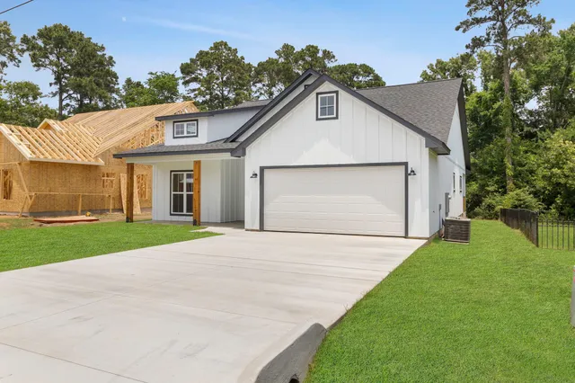 a view of outdoor space yard and garage
