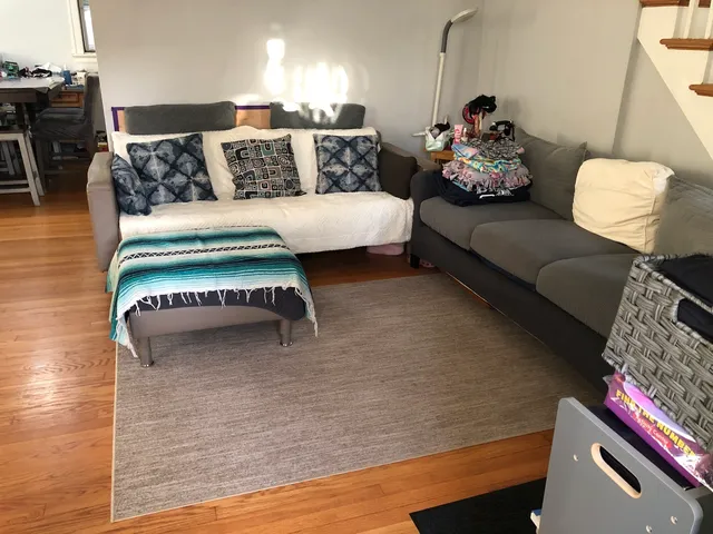 a living room with furniture and a couch