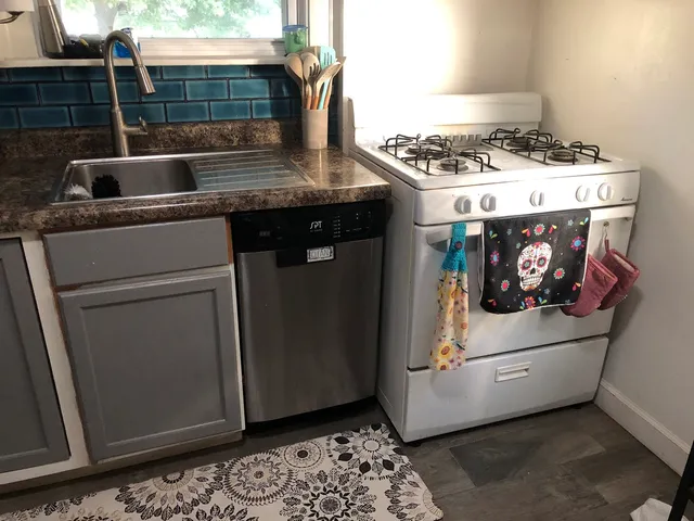 a utility room with washer and dryer