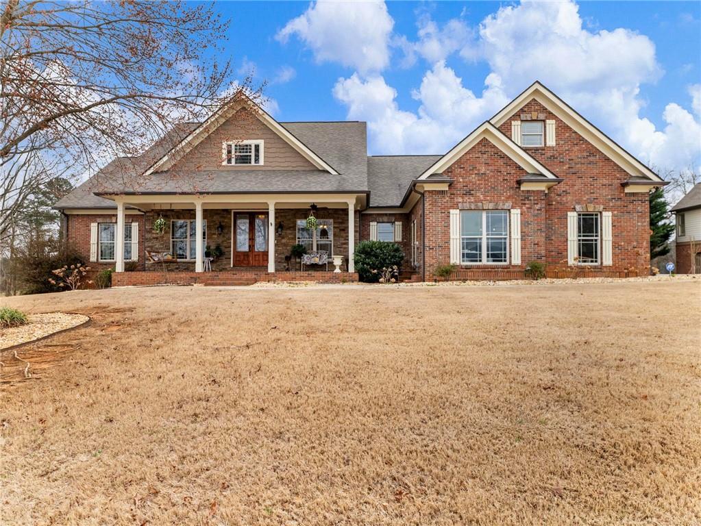 front view of a house with a yard