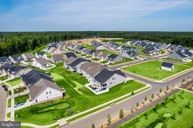 an aerial view of a house with a garden