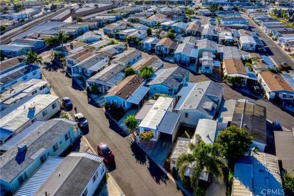 an aerial view of a city with lots of residential buildings