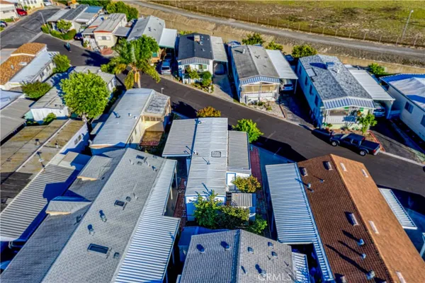 an aerial view of a residential houses and city street