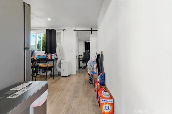 a room with furniture and gym equipment