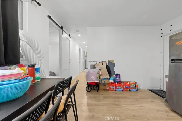 a kitchen with stainless steel appliances a stove and cabinets