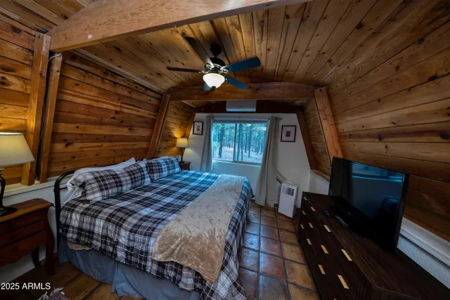a kitchen with granite countertop stainless steel appliances and wooden cabinets