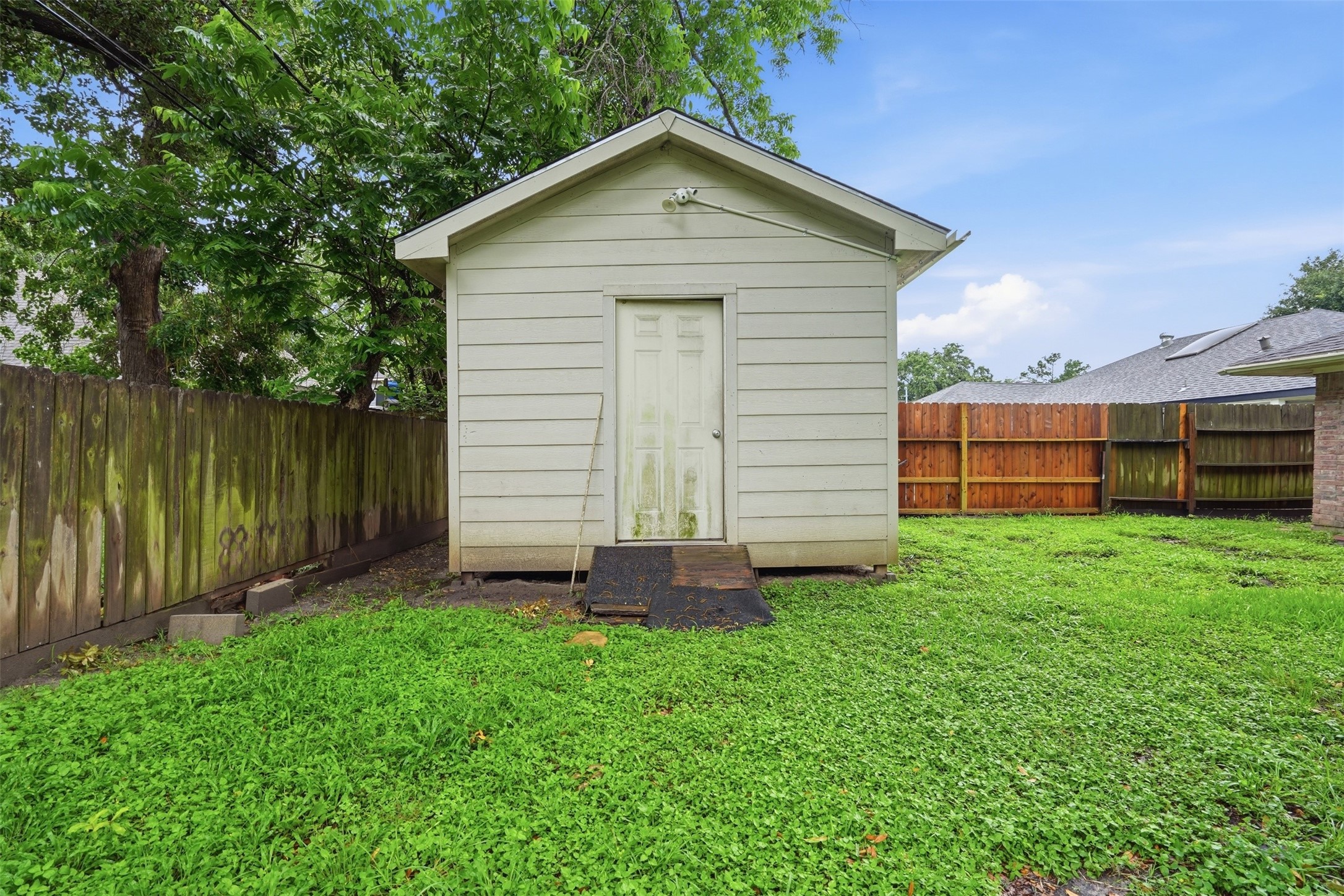 2605 Burke Road Pasadena, TX 77502 - Photo 27 of 29 a front view of a house with garden