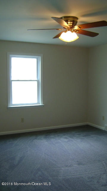 1807 Laurel Terrace Lake Como, NJ 07719 - Photo 8 of 9 an empty room with a window