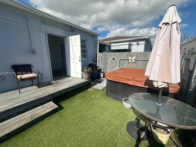 a bed room with furniture and a window