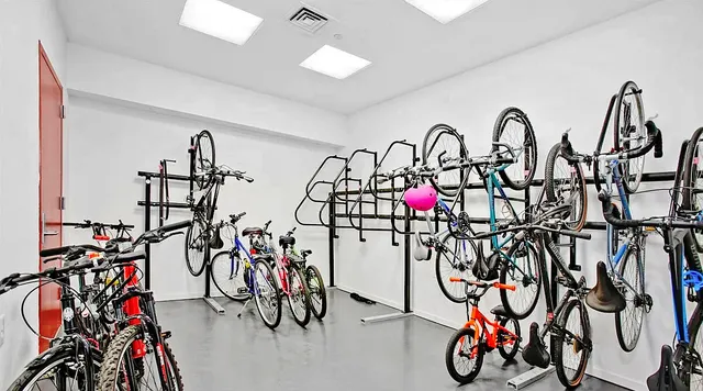 a view of a chair and table in backyard of the house