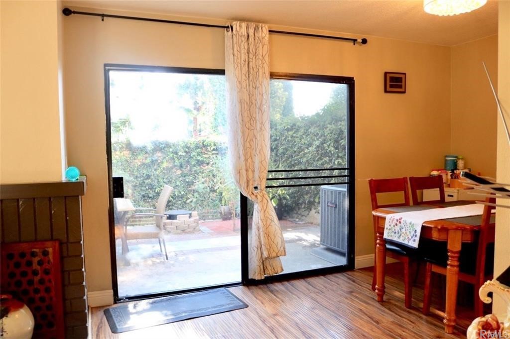 11810 Los Alisos Circle Norwalk, CA 90650 - Photo 11 of 26 Living area looking out to dining and patio area's