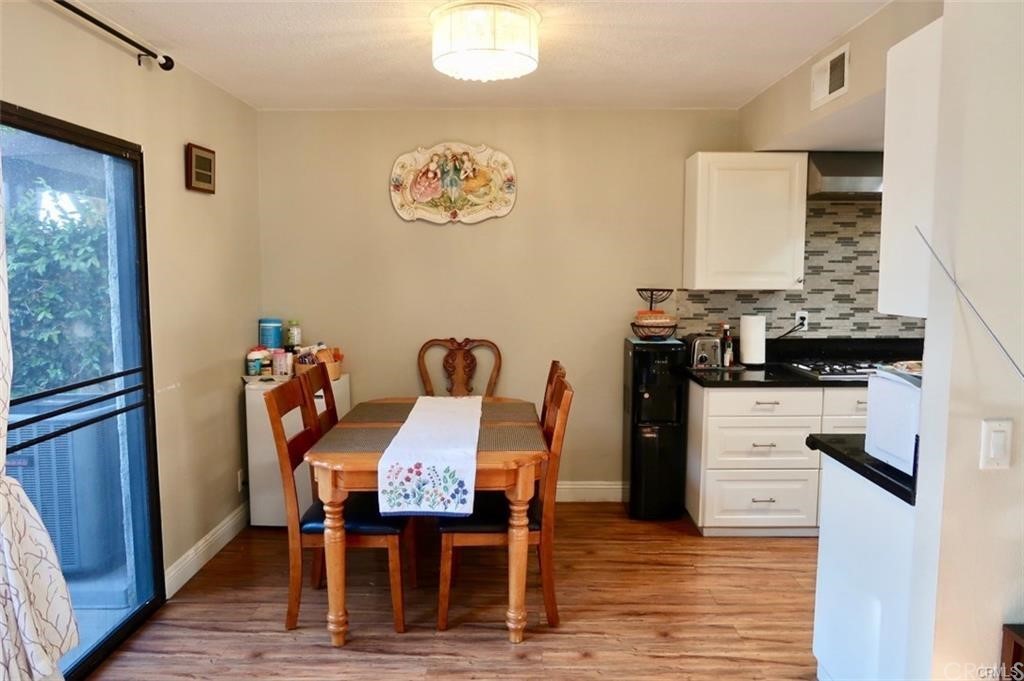 11810 Los Alisos Circle Norwalk, CA 90650 - Photo 10 of 26 standing in living room looking into dining area