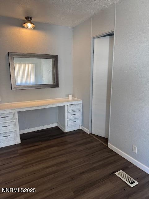 241 Harmony Lane Sun Valley, NV 89433 - Photo 11 of 29 a view of an empty room with wooden floor and a window