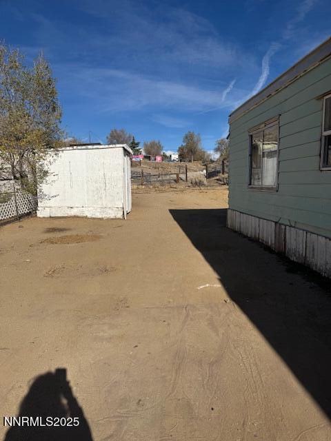 241 Harmony Lane Sun Valley, NV 89433 - Photo 2 of 29 a view of building with ocean view