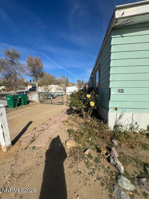 241 Harmony Lane Sun Valley, NV 89433 - Photo 23 of 29 a view of a backyard of the house
