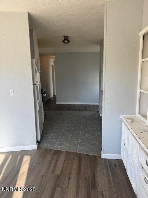 241 Harmony Lane Sun Valley, NV 89433 - Photo 28 of 29 an empty room with wooden floor and cabinet
