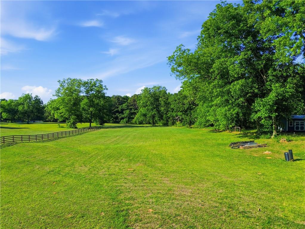 880 Johnstonville Road Barnesville, GA 30204 - Photo 33 of 33 a view of a golf course with a lake