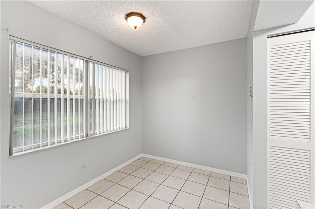 161 Wading Bird Circle, Unit L101 Naples, FL 34110 - Photo 2 of 35 a view of an empty room with a window