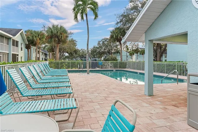 an outdoor space with furniture and garden