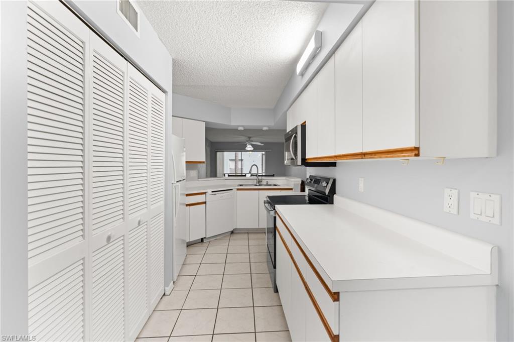 161 Wading Bird Circle, Unit L101 Naples, FL 34110 - Photo 4 of 35