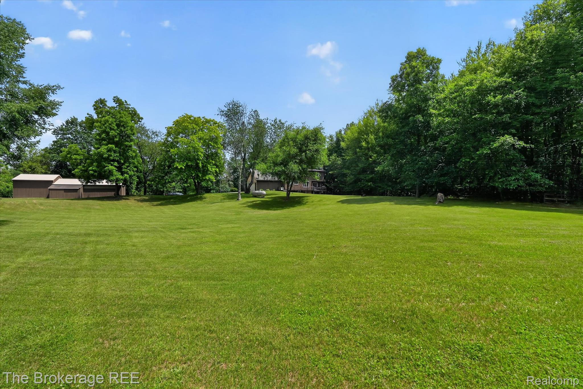 13269 North Genesee Road Clio, MI 48420 - Photo 50 of 67 Expansive green lawn providing abundant outdoor space