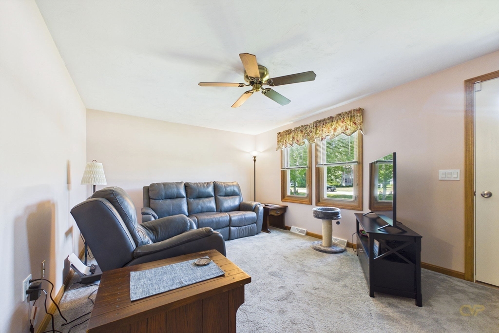 8 Cotuit Road Taunton, MA 02718 - Photo 12 of 24 a living room with furniture and a window