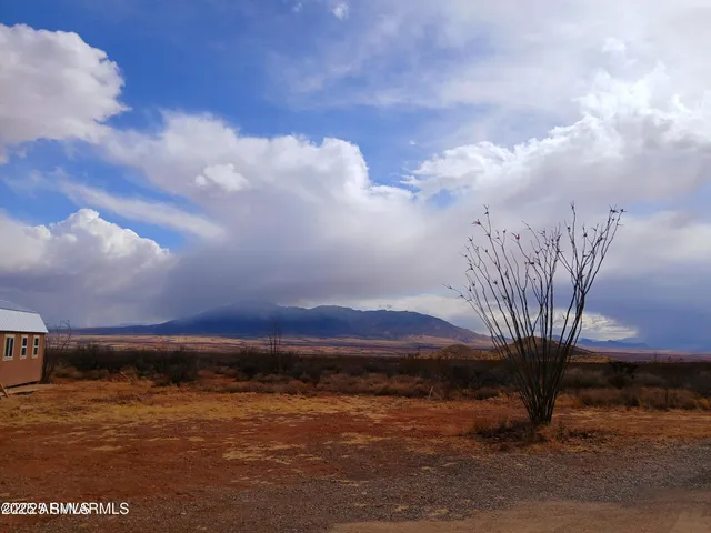 a view of sunset and mountains