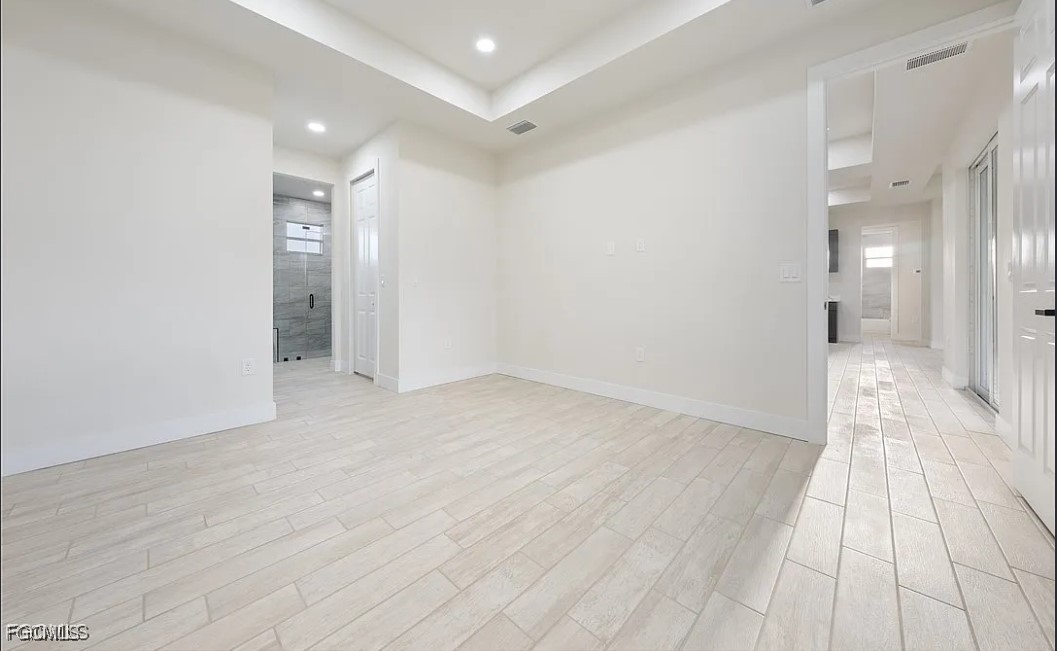 2719 42nd Street West Lehigh Acres, FL 33971 - Photo 17 of 20 a view of a hallway with wooden floor