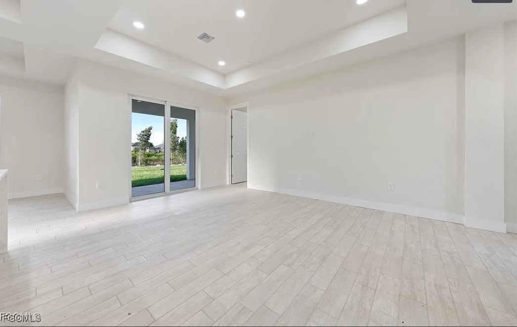 2719 42nd Street West Lehigh Acres, FL 33971 - Photo 9 of 20 a view of an empty room with a window