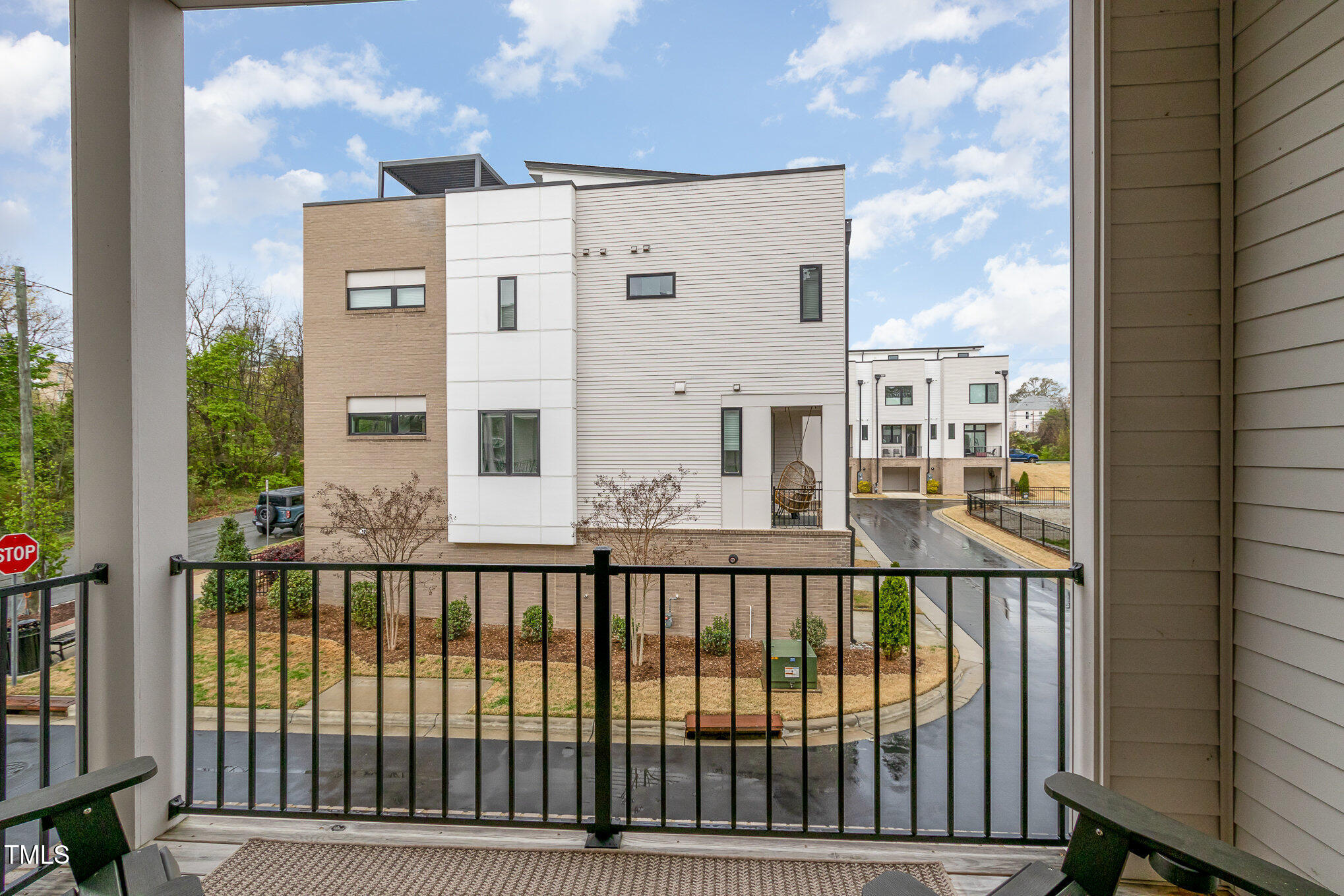 607 North Queen Street Durham, NC 27701 - Photo 14 of 35 a balcony view with a garden