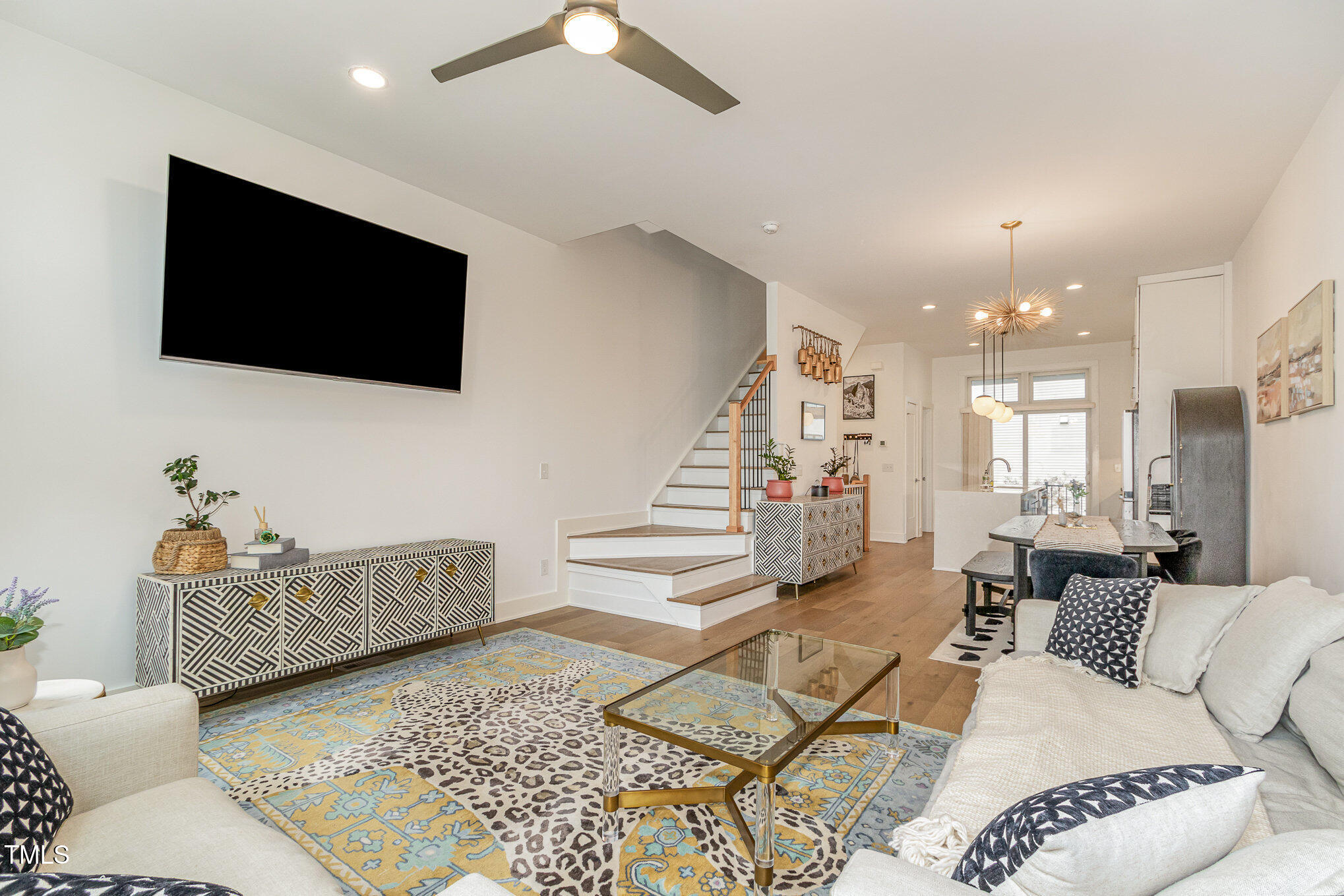607 North Queen Street Durham, NC 27701 - Photo 2 of 35 a living room with furniture and a flat screen tv