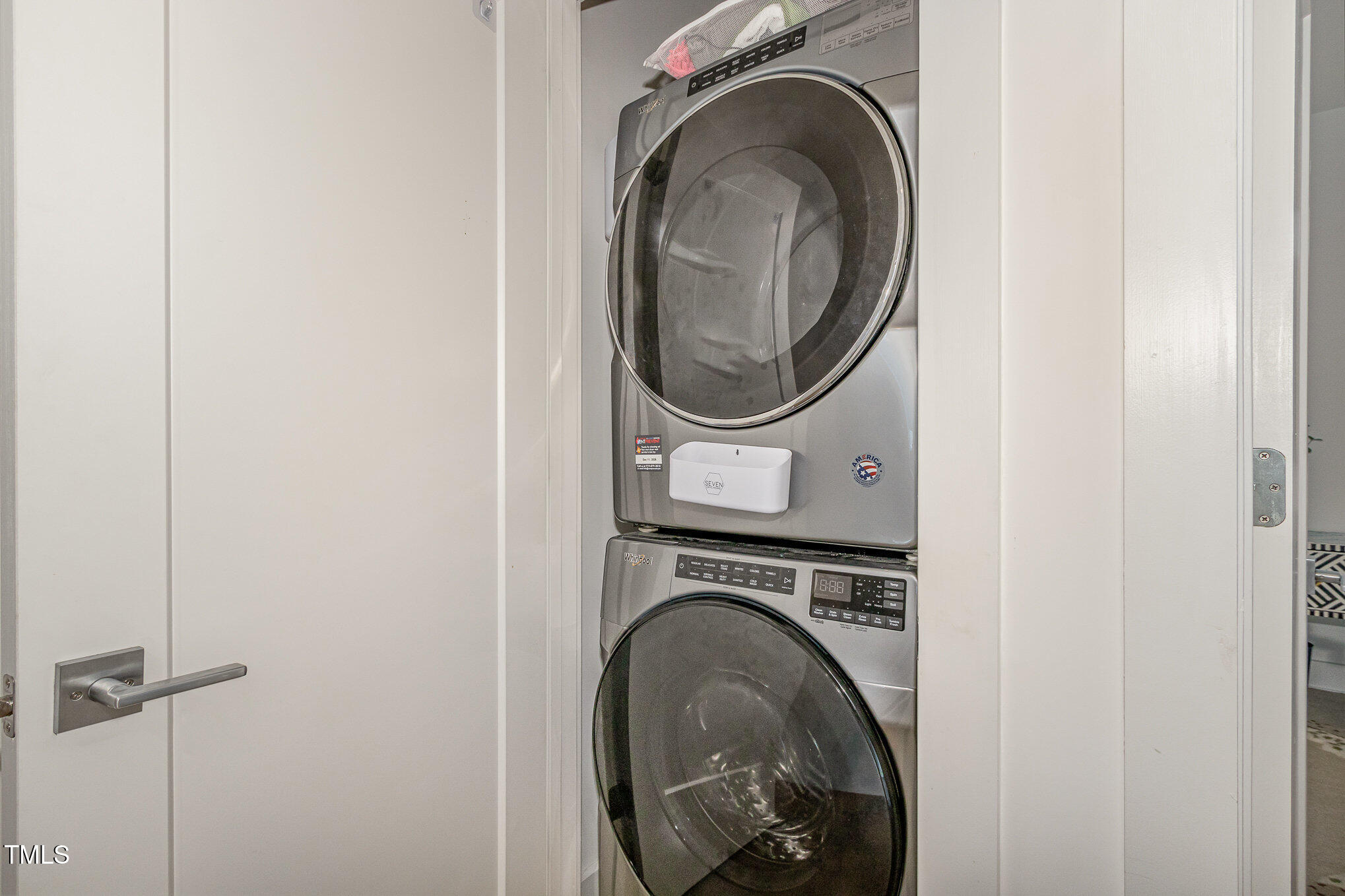 607 North Queen Street Durham, NC 27701 - Photo 22 of 35 a view of a storage & utility room with a washer