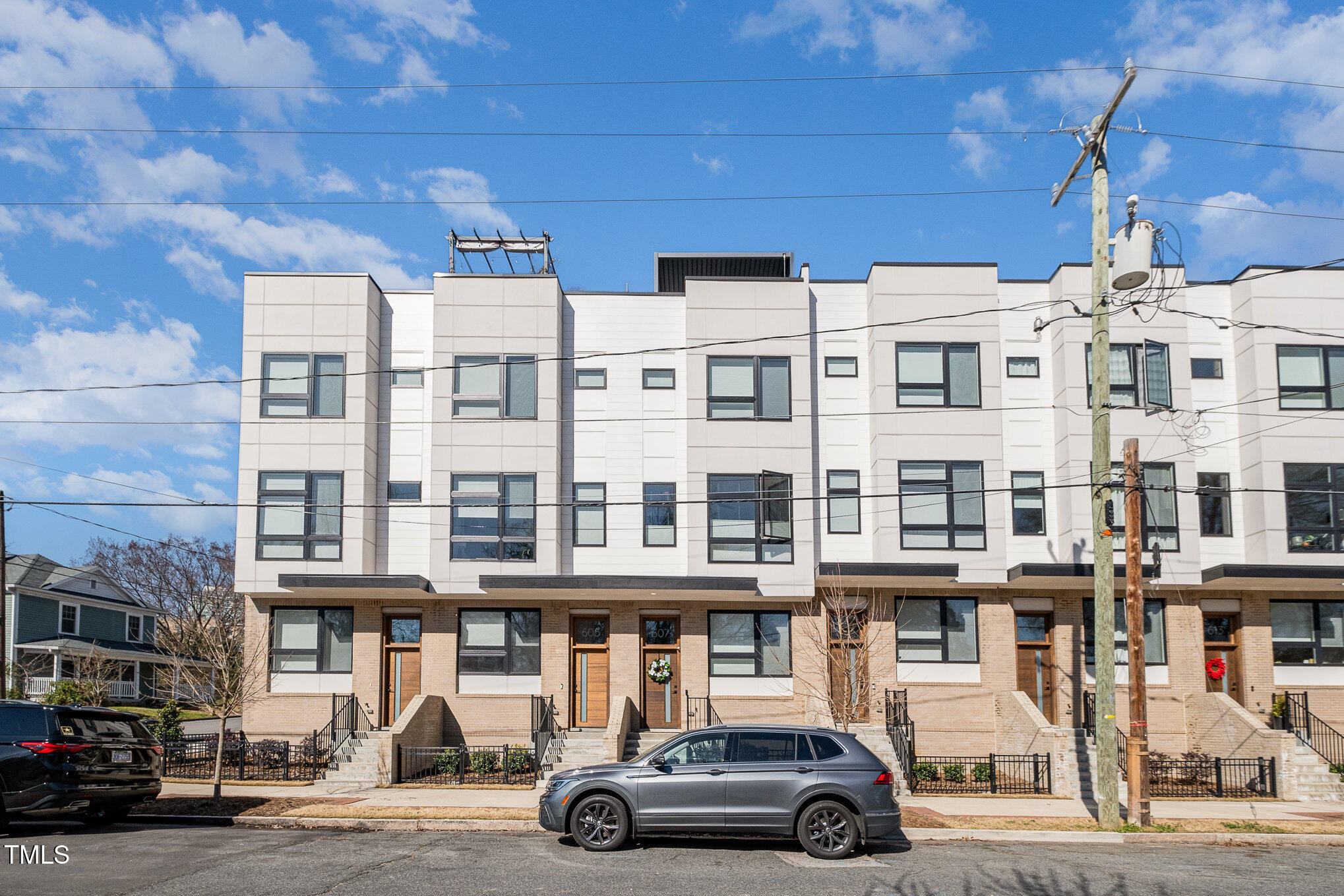 607 North Queen Street Durham, NC 27701 - Photo 27 of 35 a car parked in front of a building