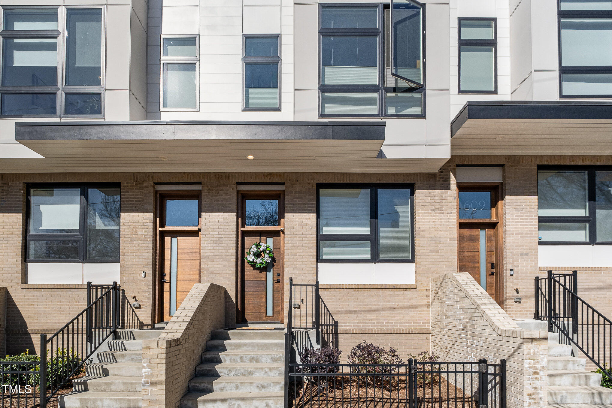 607 North Queen Street Durham, NC 27701 - Photo 28 of 35 a front view of a building with many windows