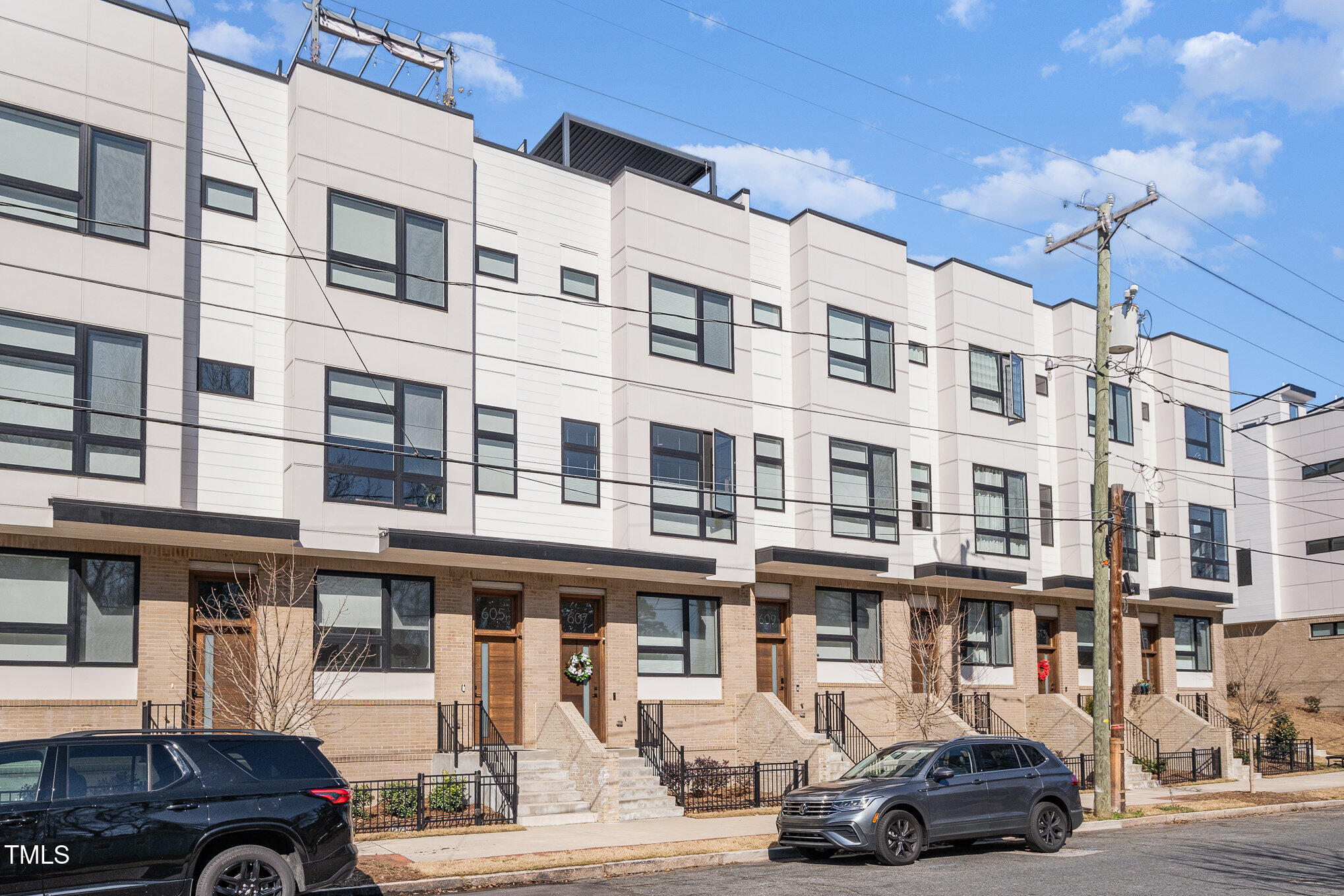 607 North Queen Street Durham, NC 27701 - Photo 29 of 35 a car parked in front of a building