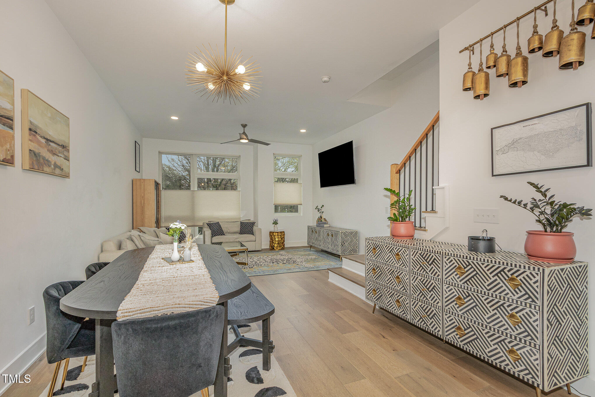 607 North Queen Street Durham, NC 27701 - Photo 8 of 35 a living room with furniture and a flat screen tv