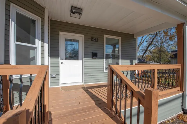 a view of balcony with wooden floor and deck