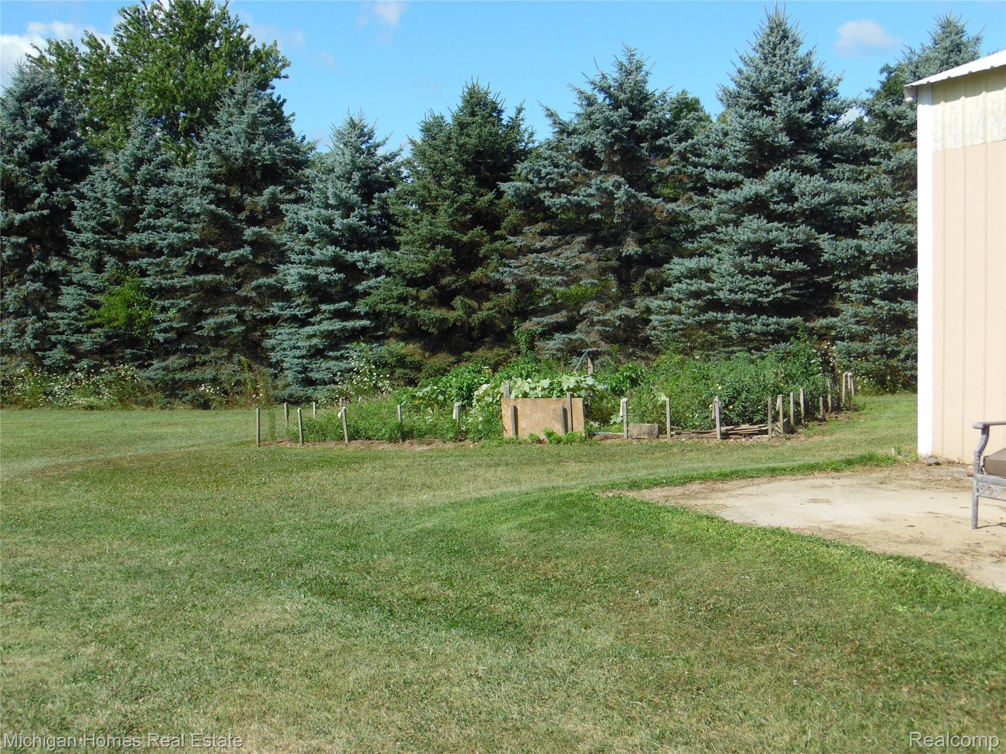 7235 Lahring Road Gaines, MI 48436 - Photo 54 of 81 GARDEN AREA BEHIND POLE BARN - GROW WHATEVER YOU LIKE!