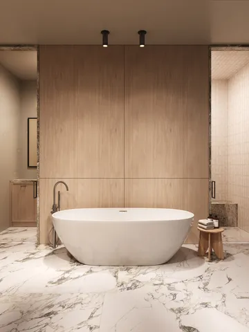a bathroom with a bathtub and shower