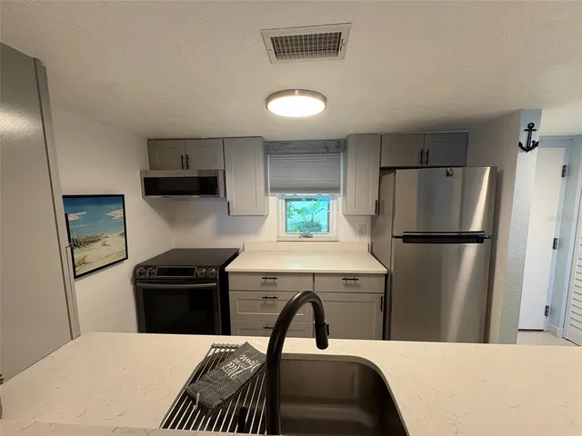 $359,900 | 464 North Paula Drive, Unit 116, Dunedin, FL 34698