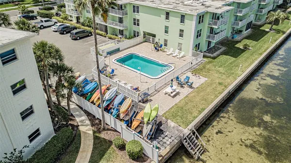 a view of a swimming pool with a terrace