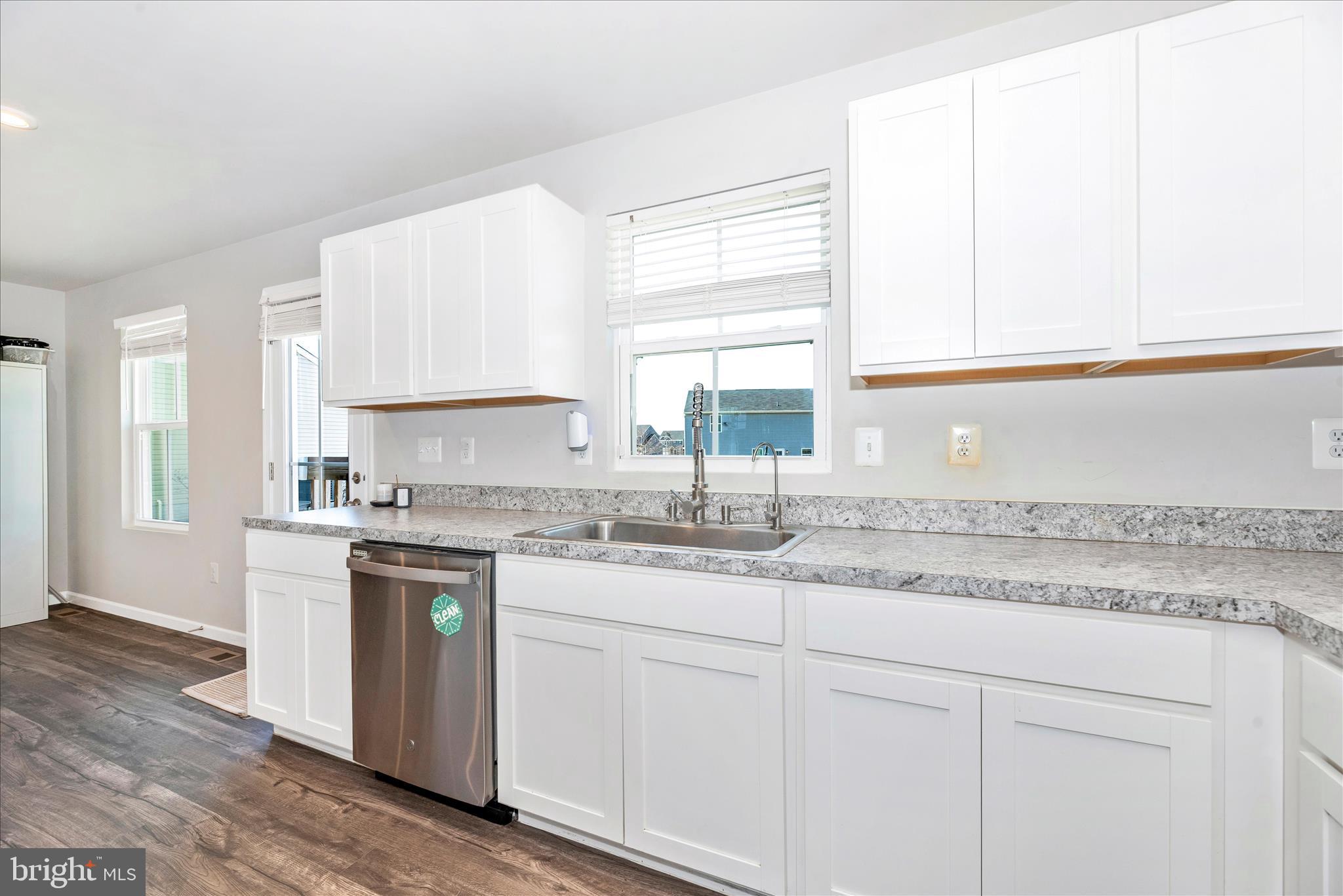 336 Burnside Avenue Taneytown, MD 21787 - Photo 17 of 53 a kitchen with stainless steel appliances granite countertop a sink and a stove