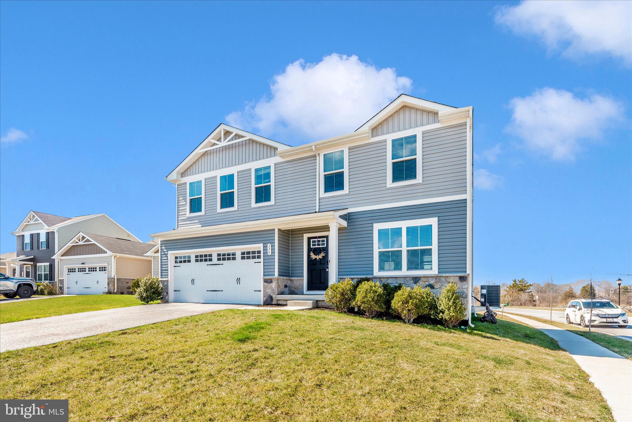 336 Burnside Avenue Taneytown, MD 21787 - Photo 2 of 53 a front view of a house with garden