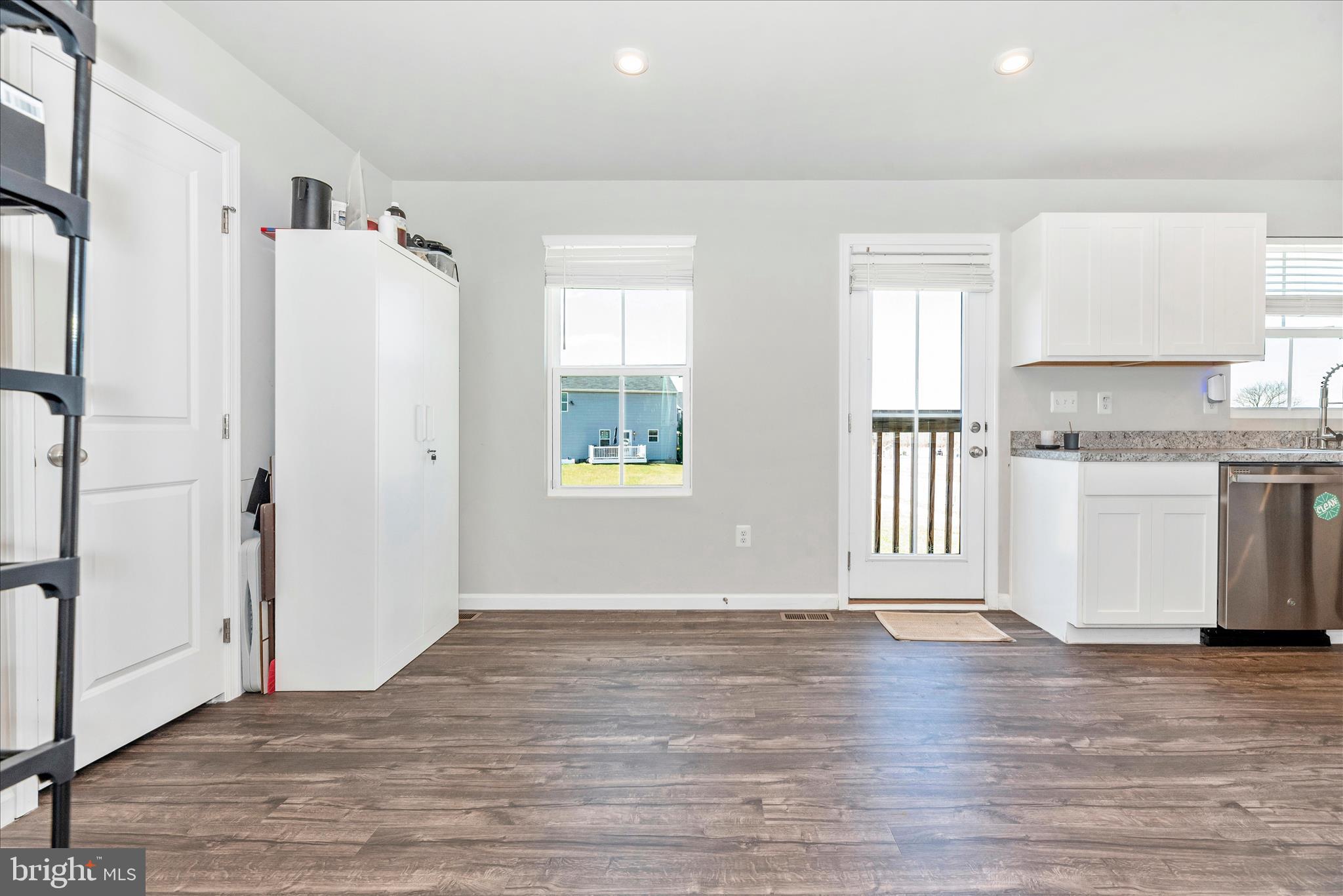 336 Burnside Avenue Taneytown, MD 21787 - Photo 24 of 53 a view of a kitchen with wooden floor and a window