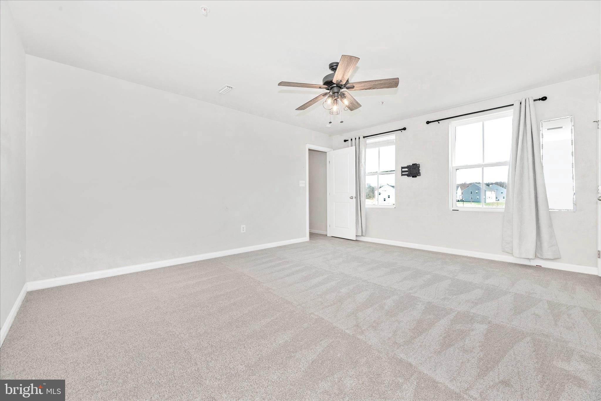 336 Burnside Avenue Taneytown, MD 21787 - Photo 30 of 53 a view of an empty room with a window