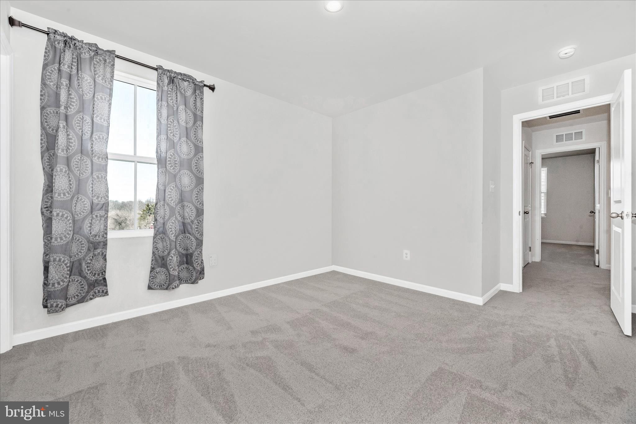 336 Burnside Avenue Taneytown, MD 21787 - Photo 39 of 53 a view of an empty room with a window