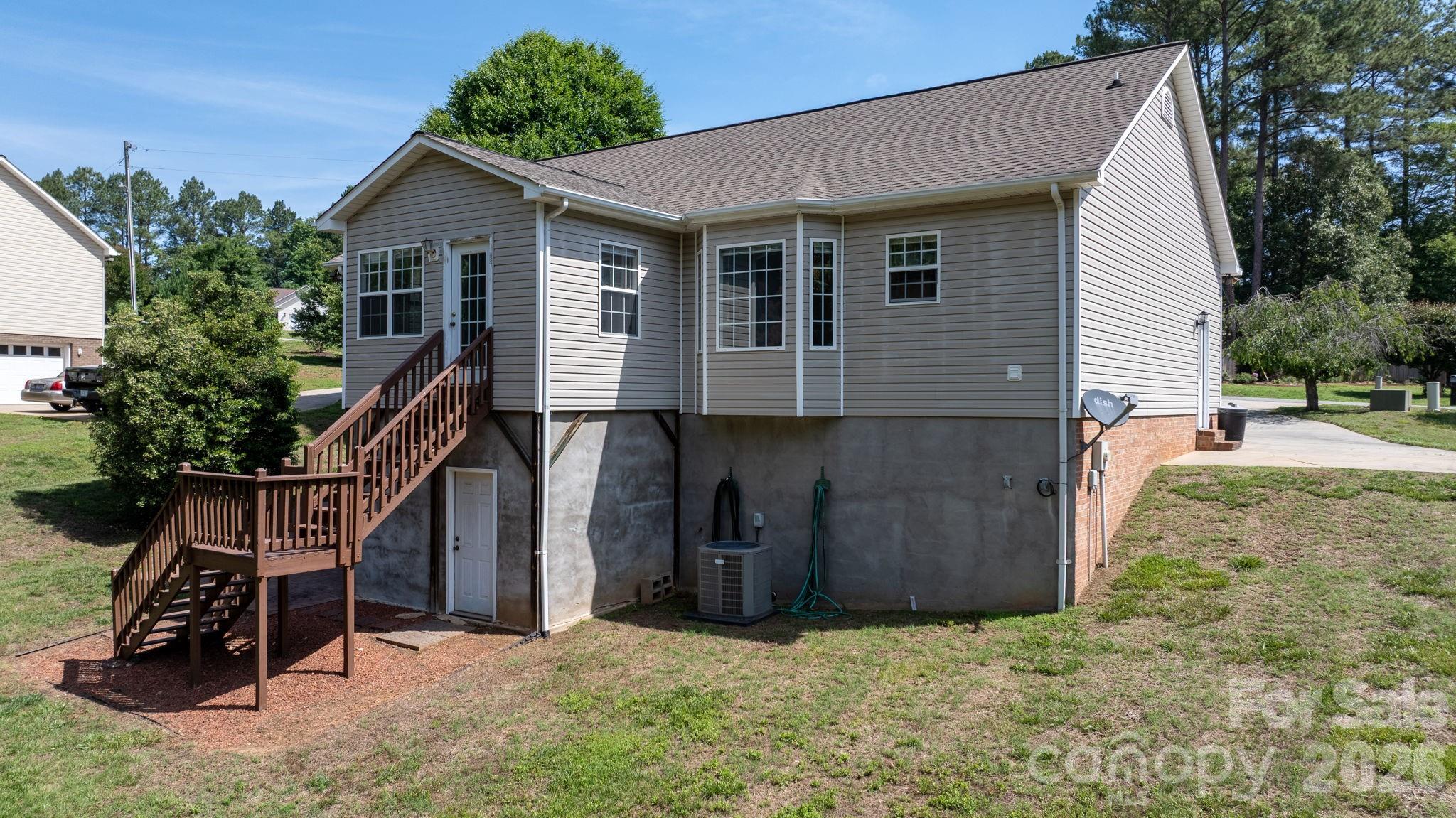 4967 Addison Lane Hickory, NC 28601 - Photo 33 of 43 a view of a house with backyard and trees