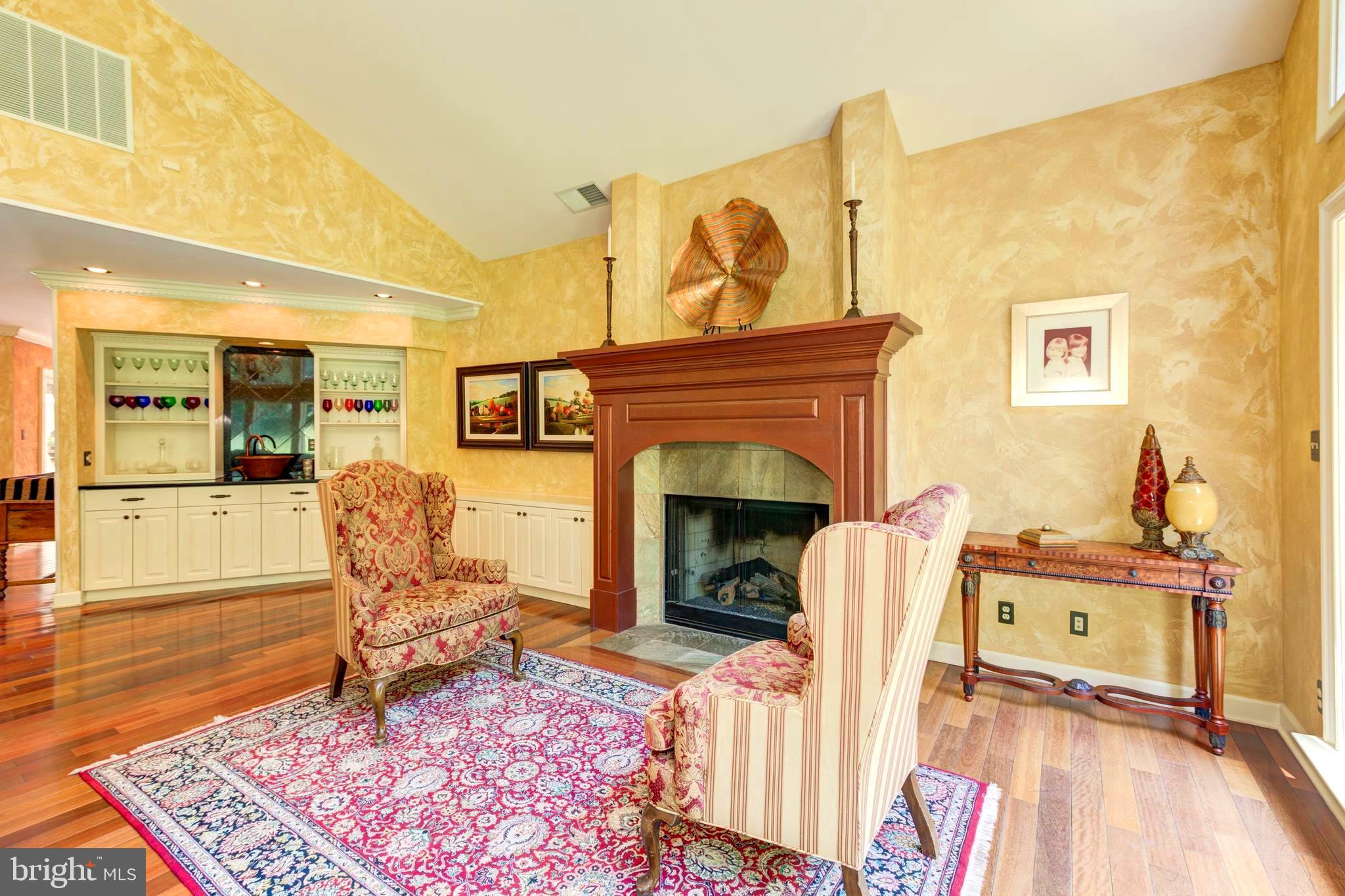 724 Clear Spring Road Great Falls, VA 22066 - Photo 13 of 57 Imagine reading by a gas fireplace!