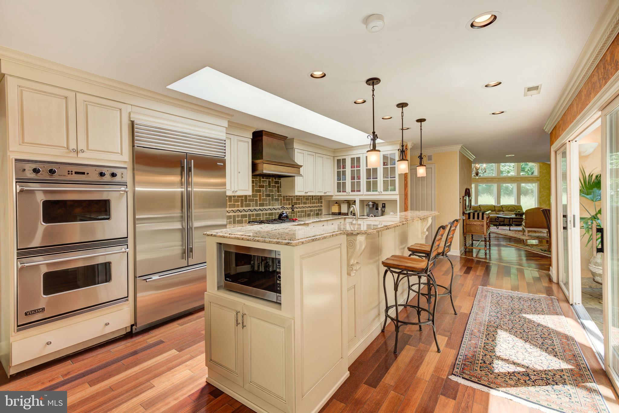 724 Clear Spring Road Great Falls, VA 22066 - Photo 17 of 57 Notice the pendant and recessed lights