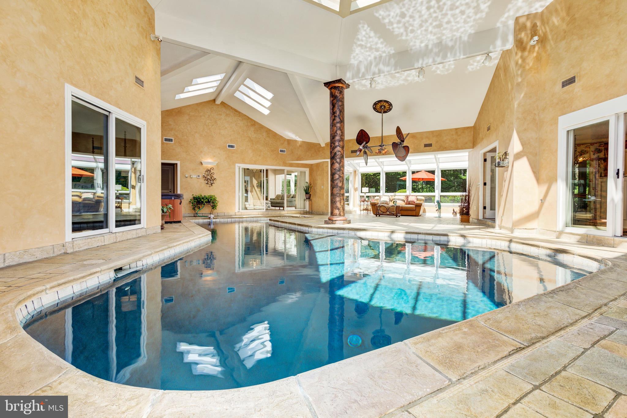 724 Clear Spring Road Great Falls, VA 22066 - Photo 21 of 57 20000 gallon heated salt water pool